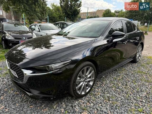 Черный Мазда 3, объемом двигателя 2.49 л и пробегом 36 тыс. км за 21500 $, фото 1 на Automoto.ua