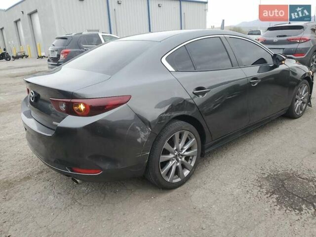 Черный Мазда 3, объемом двигателя 2.49 л и пробегом 34 тыс. км за 3000 $, фото 2 на Automoto.ua
