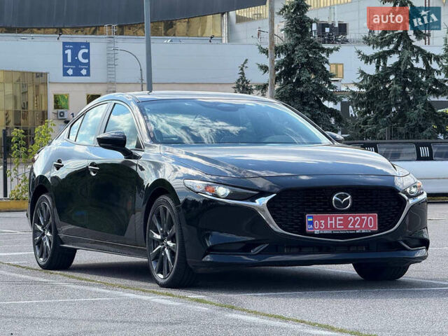 Черный Мазда 3, объемом двигателя 2.49 л и пробегом 23 тыс. км за 20900 $, фото 2 на Automoto.ua