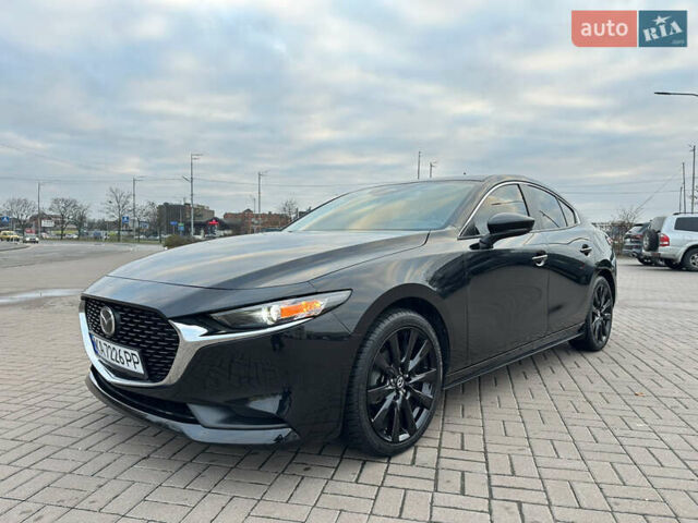 Черный Мазда 3, объемом двигателя 2.49 л и пробегом 31 тыс. км за 19555 $, фото 2 на Automoto.ua