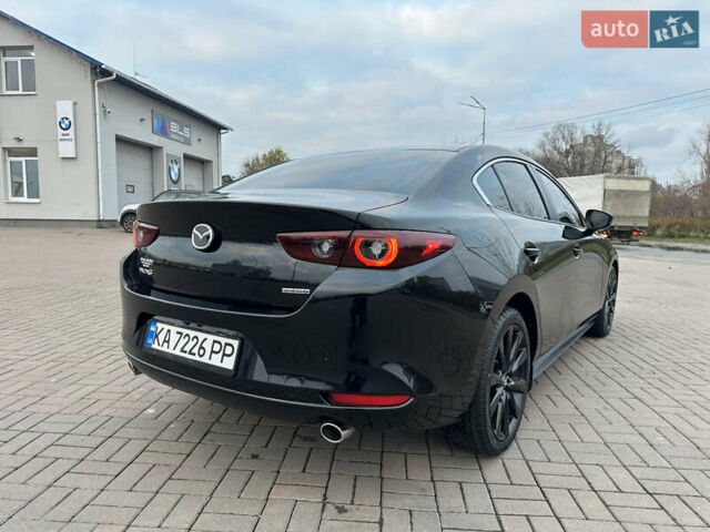 Черный Мазда 3, объемом двигателя 2.49 л и пробегом 31 тыс. км за 19555 $, фото 12 на Automoto.ua