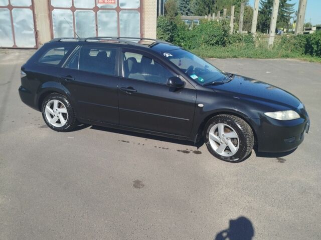 Чорний Мазда 3, об'ємом двигуна 2 л та пробігом 300 тис. км за 4300 $, фото 2 на Automoto.ua