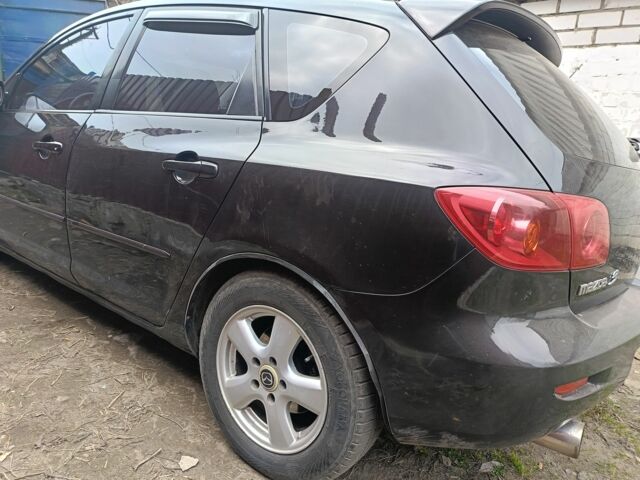 Чорний Мазда 3, об'ємом двигуна 1.6 л та пробігом 350 тис. км за 5200 $, фото 3 на Automoto.ua