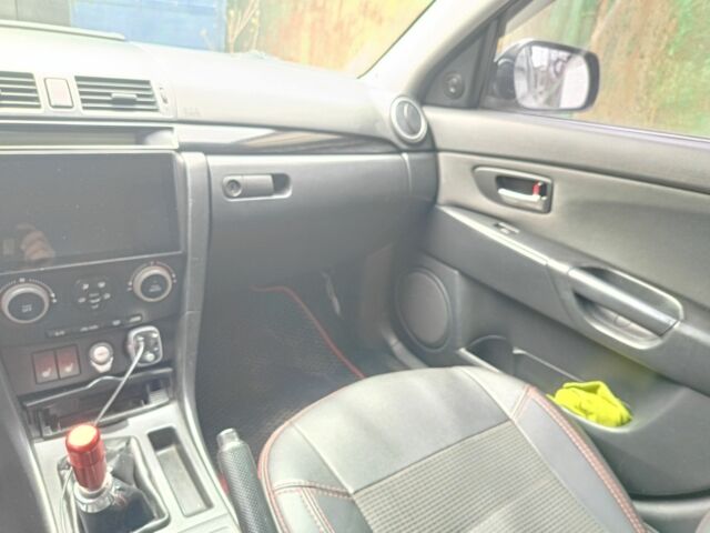 Чорний Мазда 3, об'ємом двигуна 1.6 л та пробігом 350 тис. км за 5200 $, фото 11 на Automoto.ua