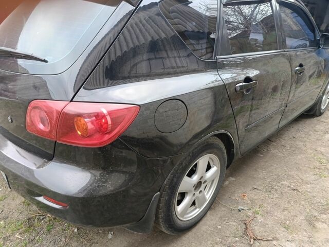 Чорний Мазда 3, об'ємом двигуна 1.6 л та пробігом 350 тис. км за 5200 $, фото 5 на Automoto.ua