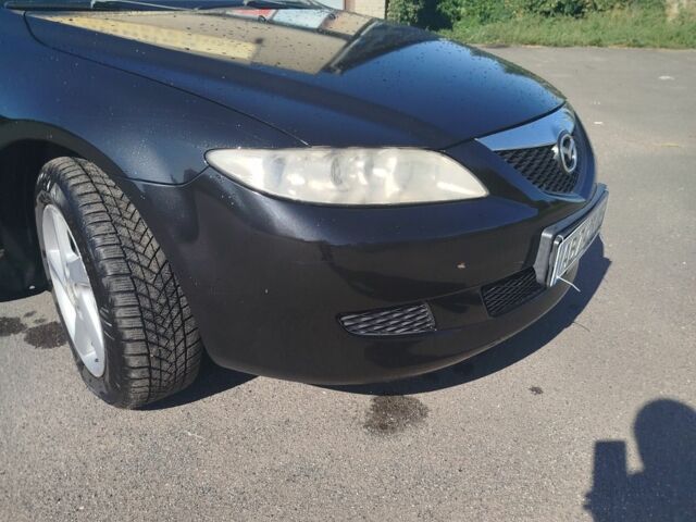 Чорний Мазда 3, об'ємом двигуна 2 л та пробігом 300 тис. км за 4300 $, фото 6 на Automoto.ua