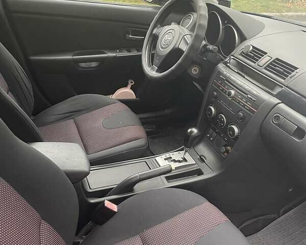 Фиолетовый Мазда 3, объемом двигателя 1.6 л и пробегом 124 тыс. км за 4900 $, фото 23 на Automoto.ua