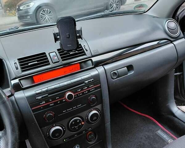 Фіолетовий Мазда 3, об'ємом двигуна 1.6 л та пробігом 303 тис. км за 4700 $, фото 3 на Automoto.ua