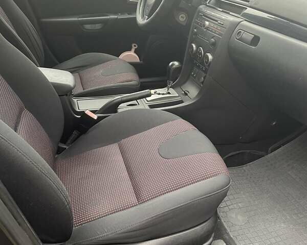 Фиолетовый Мазда 3, объемом двигателя 1.6 л и пробегом 124 тыс. км за 4900 $, фото 20 на Automoto.ua