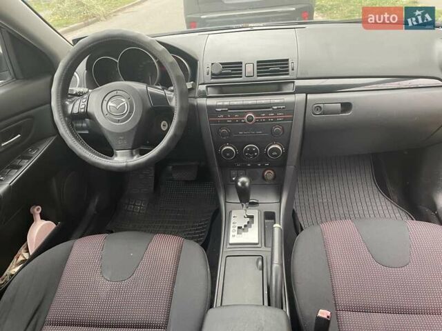 Фиолетовый Мазда 3, объемом двигателя 1.6 л и пробегом 124 тыс. км за 4900 $, фото 26 на Automoto.ua