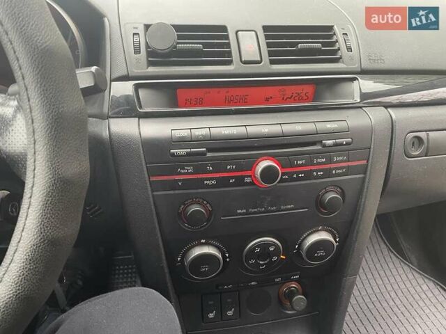 Фиолетовый Мазда 3, объемом двигателя 1.6 л и пробегом 124 тыс. км за 4900 $, фото 30 на Automoto.ua