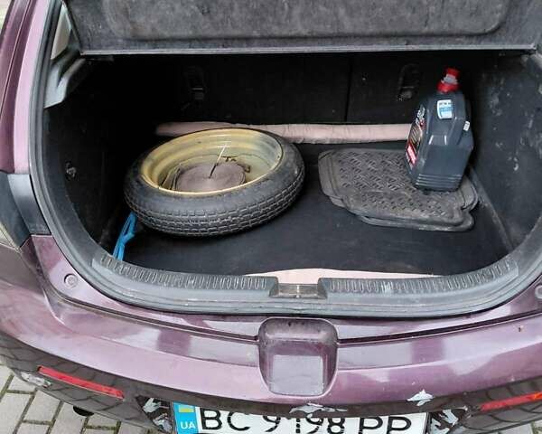 Фіолетовий Мазда 3, об'ємом двигуна 1.6 л та пробігом 303 тис. км за 4700 $, фото 2 на Automoto.ua