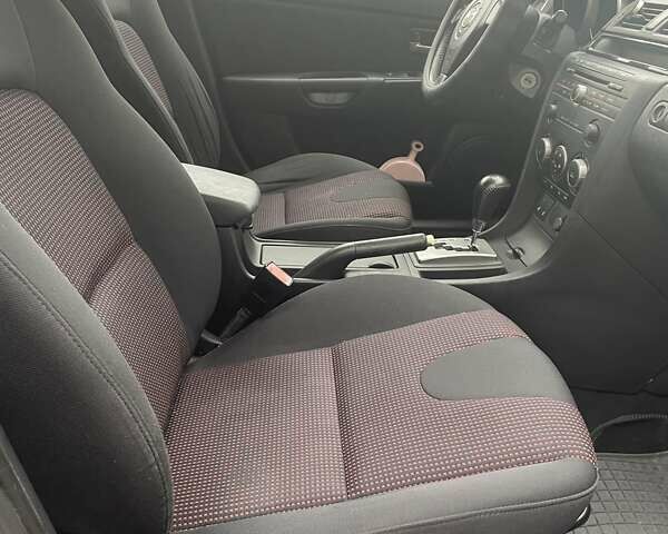 Фиолетовый Мазда 3, объемом двигателя 1.6 л и пробегом 124 тыс. км за 4900 $, фото 21 на Automoto.ua