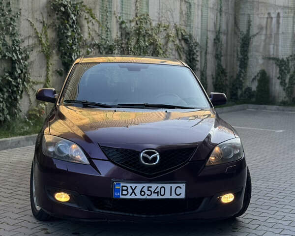 Мазда 3 2007 в Хмельницком на Automoto.ua Фиолетовый Мазда 3, объемом двигателя 1.6 л и пробегом 202 тыс. км за 3500 $, фото 3 на Automoto.ua