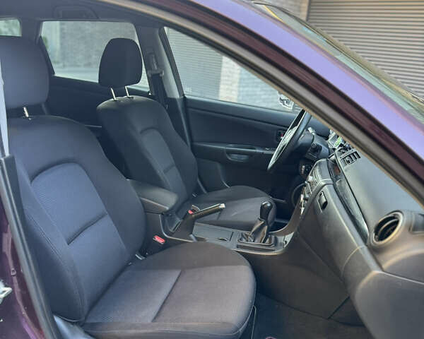 Мазда 3 2007 в Хмельницком на Automoto.ua Фиолетовый Мазда 3, объемом двигателя 1.6 л и пробегом 202 тыс. км за 3500 $, фото 9 на Automoto.ua