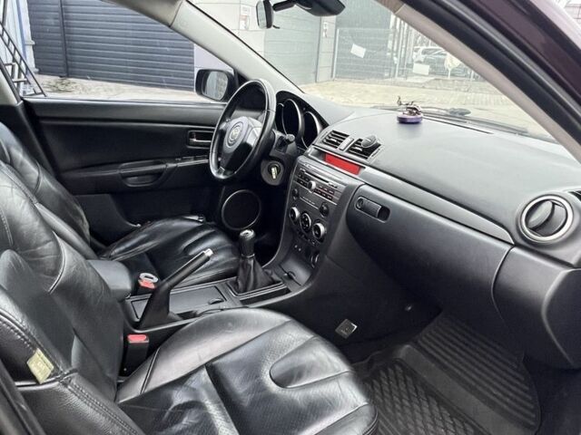 Фиолетовый Мазда 3, объемом двигателя 2 л и пробегом 222 тыс. км за 4700 $, фото 16 на Automoto.ua