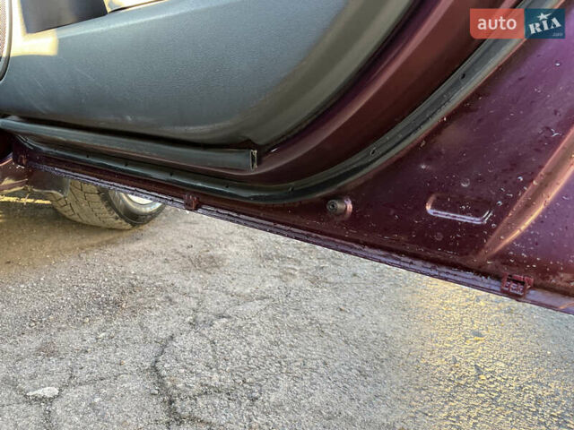 Фіолетовий Мазда 3, об'ємом двигуна 1.6 л та пробігом 210 тис. км за 4100 $, фото 10 на Automoto.ua