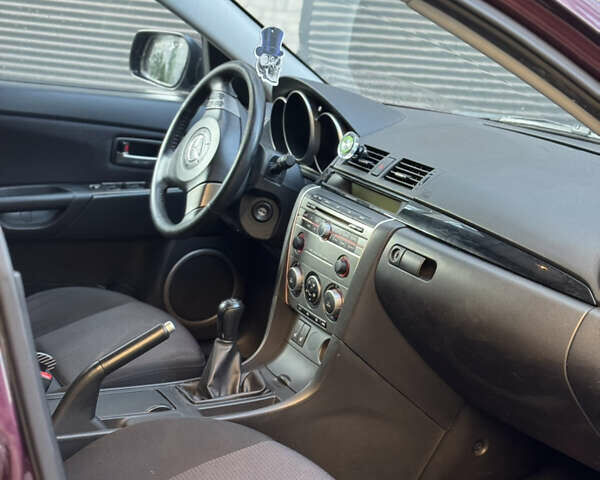 Мазда 3 2007 в Хмельницком на Automoto.ua Фиолетовый Мазда 3, объемом двигателя 1.6 л и пробегом 202 тыс. км за 3500 $, фото 10 на Automoto.ua