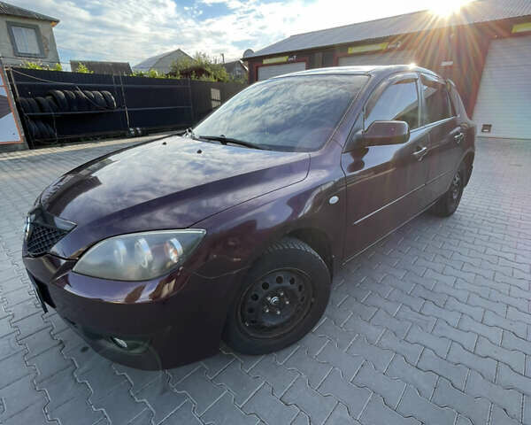 Фиолетовый Мазда 3, объемом двигателя 1.6 л и пробегом 270 тыс. км за 6250 $, фото 3 на Automoto.ua