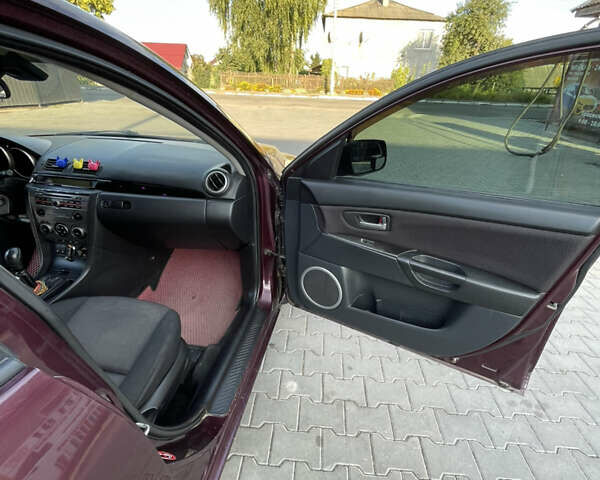 Фиолетовый Мазда 3, объемом двигателя 1.6 л и пробегом 270 тыс. км за 6250 $, фото 20 на Automoto.ua