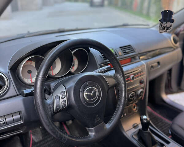 Мазда 3 2007 в Хмельницком на Automoto.ua Фиолетовый Мазда 3, объемом двигателя 1.6 л и пробегом 202 тыс. км за 3500 $, фото 15 на Automoto.ua