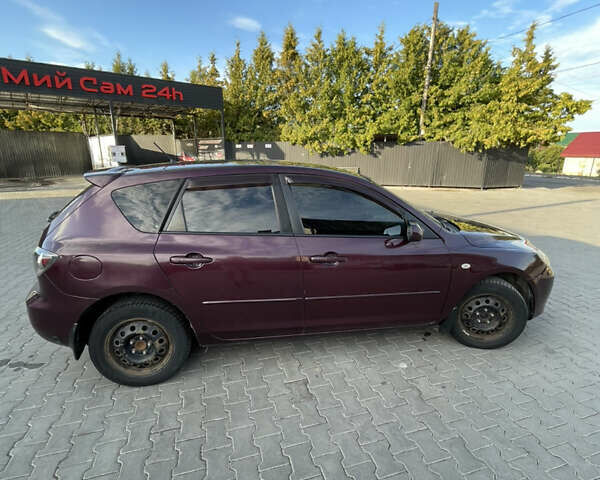 Фиолетовый Мазда 3, объемом двигателя 1.6 л и пробегом 270 тыс. км за 6250 $, фото 9 на Automoto.ua