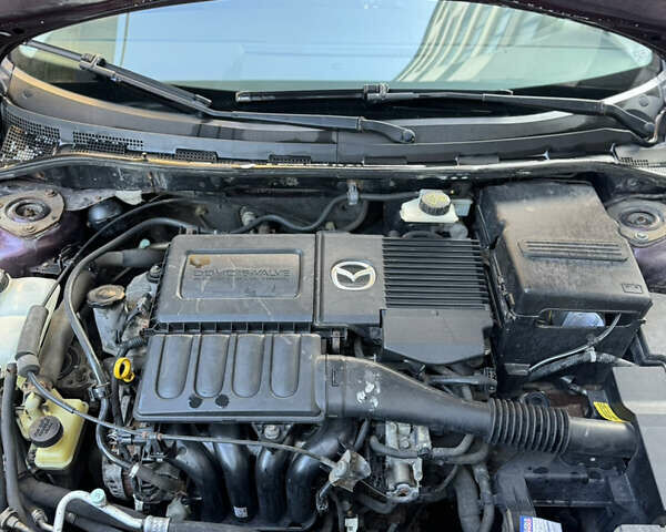 Мазда 3 2007 в Хмельницком на Automoto.ua Фиолетовый Мазда 3, объемом двигателя 1.6 л и пробегом 202 тыс. км за 3500 $, фото 20 на Automoto.ua