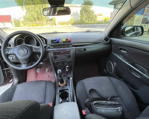 Фиолетовый Мазда 3, объемом двигателя 1.6 л и пробегом 270 тыс. км за 6250 $, фото 19 на Automoto.ua