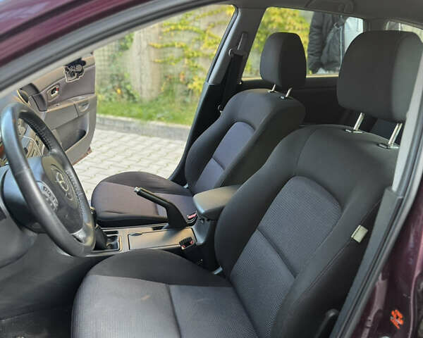 Мазда 3 2007 в Хмельницком на Automoto.ua Фиолетовый Мазда 3, объемом двигателя 1.6 л и пробегом 202 тыс. км за 3500 $, фото 13 на Automoto.ua
