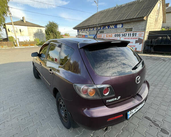 Фиолетовый Мазда 3, объемом двигателя 1.6 л и пробегом 270 тыс. км за 6250 $, фото 5 на Automoto.ua