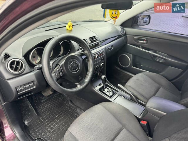 Фиолетовый Мазда 3, объемом двигателя 1.6 л и пробегом 296 тыс. км за 4250 $, фото 12 на Automoto.ua