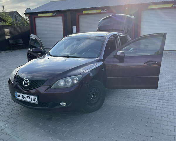 Фиолетовый Мазда 3, объемом двигателя 1.6 л и пробегом 270 тыс. км за 6250 $, фото 26 на Automoto.ua