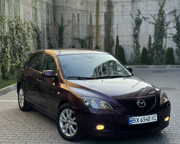 Мазда 3 2007 в Хмельницком на Automoto.ua Фиолетовый Мазда 3, объемом двигателя 1.6 л и пробегом 202 тыс. км за 3500 $, фото 2 на Automoto.ua