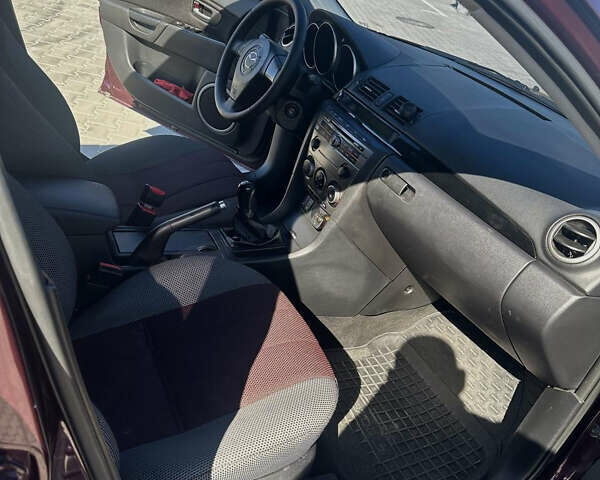Фиолетовый Мазда 3, объемом двигателя 1.6 л и пробегом 146 тыс. км за 5300 $, фото 12 на Automoto.ua