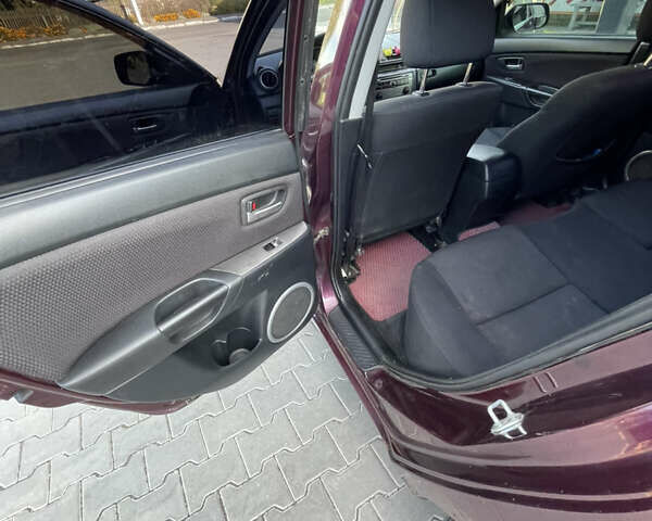 Фиолетовый Мазда 3, объемом двигателя 1.6 л и пробегом 270 тыс. км за 6250 $, фото 17 на Automoto.ua