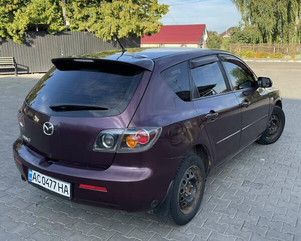 Фиолетовый Мазда 3, объемом двигателя 1.6 л и пробегом 270 тыс. км за 6250 $, фото 13 на Automoto.ua