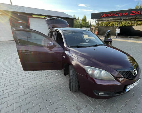 Фиолетовый Мазда 3, объемом двигателя 1.6 л и пробегом 270 тыс. км за 6250 $, фото 25 на Automoto.ua