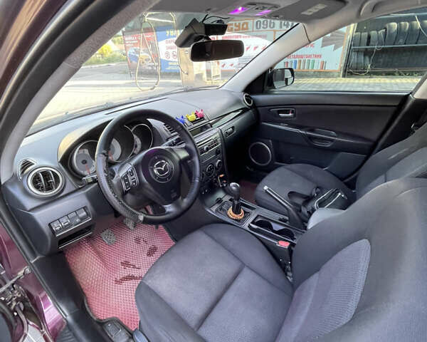 Фиолетовый Мазда 3, объемом двигателя 1.6 л и пробегом 270 тыс. км за 6250 $, фото 15 на Automoto.ua