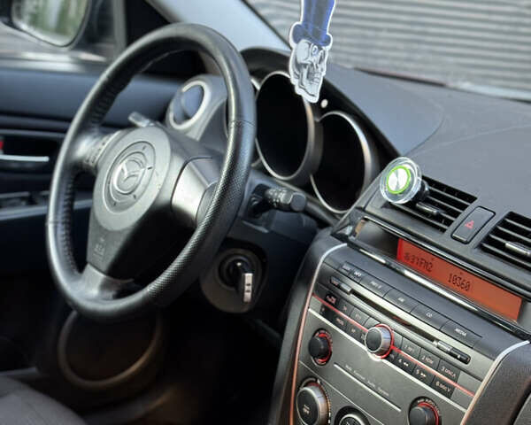 Мазда 3 2007 в Хмельницком на Automoto.ua Фиолетовый Мазда 3, объемом двигателя 1.6 л и пробегом 202 тыс. км за 3500 $, фото 11 на Automoto.ua