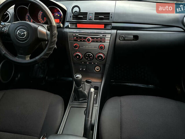 Фіолетовий Мазда 3, об'ємом двигуна 1.6 л та пробігом 186 тис. км за 6000 $, фото 19 на Automoto.ua
