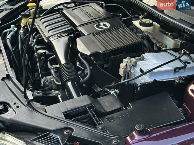 Фіолетовий Мазда 3, об'ємом двигуна 1.6 л та пробігом 186 тис. км за 6000 $, фото 16 на Automoto.ua