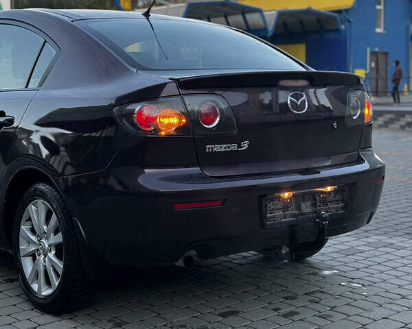 Фіолетовий Мазда 3, об'ємом двигуна 1.6 л та пробігом 224 тис. км за 5899 $, фото 4 на Automoto.ua