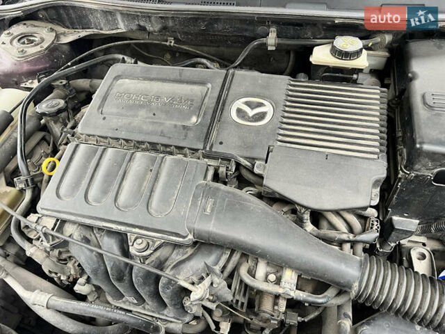 Фиолетовый Мазда 3, объемом двигателя 1.6 л и пробегом 211 тыс. км за 3750 $, фото 39 на Automoto.ua