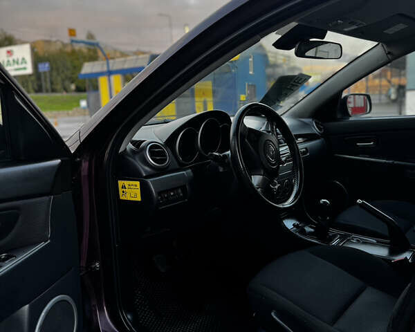 Фіолетовий Мазда 3, об'ємом двигуна 1.6 л та пробігом 224 тис. км за 5899 $, фото 50 на Automoto.ua