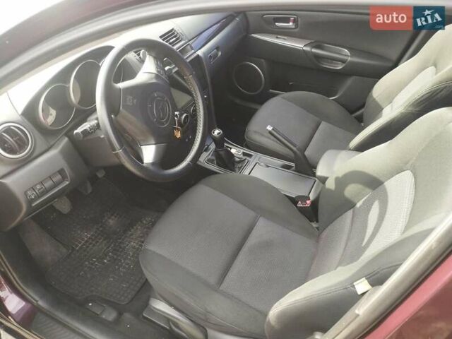 Фиолетовый Мазда 3, объемом двигателя 1.6 л и пробегом 155 тыс. км за 5800 $, фото 6 на Automoto.ua