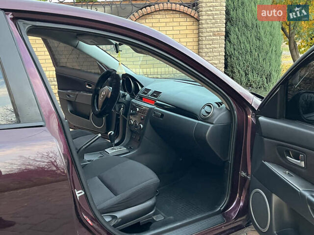 Мазда 3 2007 в Смеле на Automoto.ua Фиолетовый Мазда 3, объемом двигателя 1.6 л и пробегом 250 тыс. км за 4250 $, фото 25 на Automoto.ua