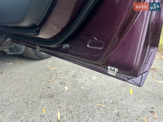 Фиолетовый Мазда 3, объемом двигателя 1.6 л и пробегом 211 тыс. км за 3750 $, фото 41 на Automoto.ua