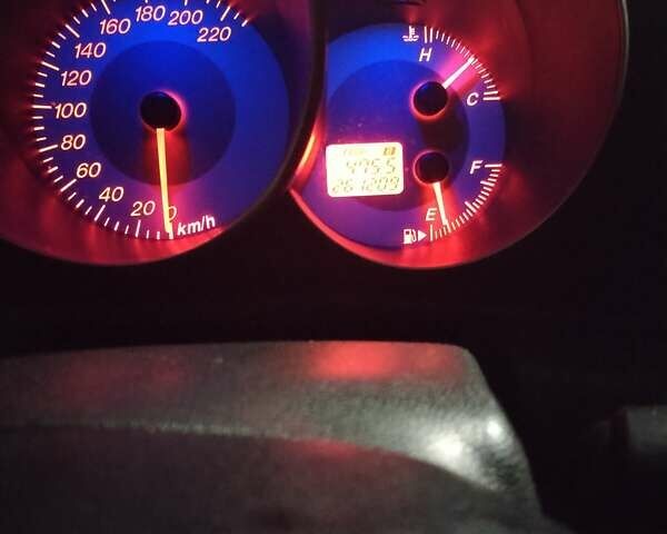 Фіолетовий Мазда 3, об'ємом двигуна 2 л та пробігом 261 тис. км за 3500 $, фото 1 на Automoto.ua