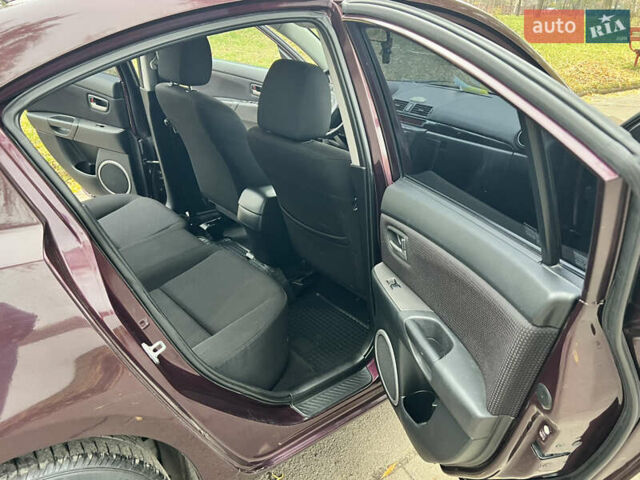 Фиолетовый Мазда 3, объемом двигателя 1.6 л и пробегом 211 тыс. км за 3750 $, фото 32 на Automoto.ua