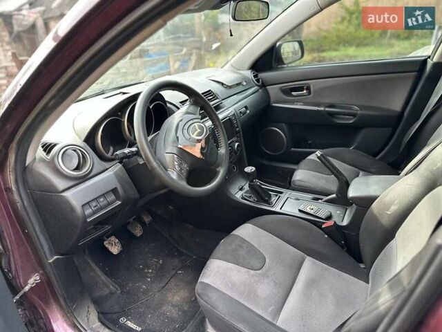 Фіолетовий Мазда 3, об'ємом двигуна 2 л та пробігом 170 тис. км за 3000 $, фото 11 на Automoto.ua